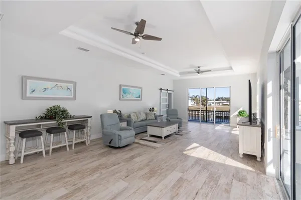 a view of a balcony with furniture