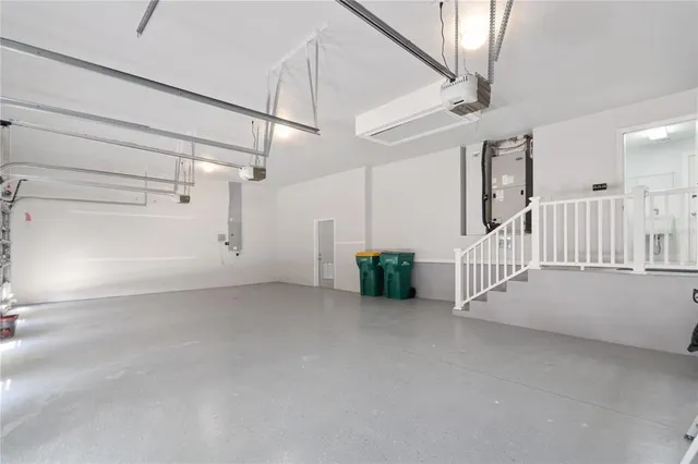 a view of an empty room with stairs