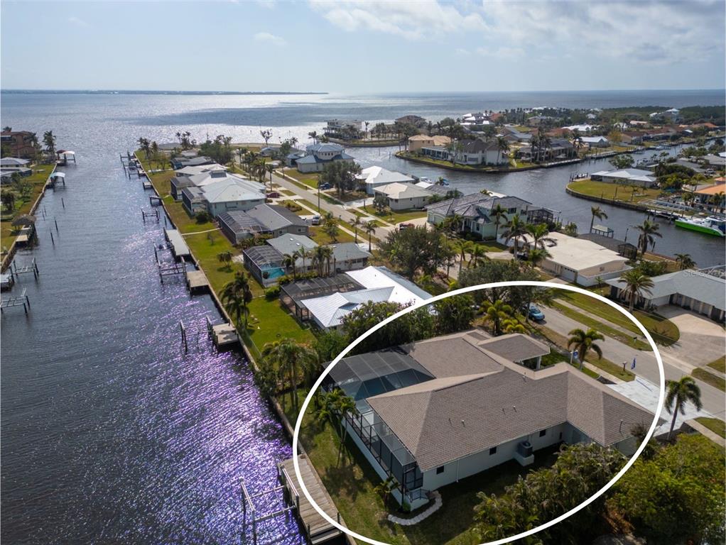 193 Beeney Road Southeast Port Charlotte, FL 33952 - Photo 3 of 45 an aerial view of a house with outdoor space