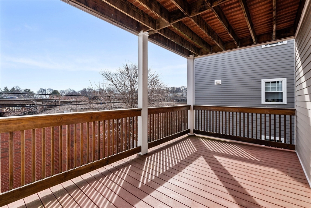 93 Sydney Street, Unit 3 Boston, MA 02125 - Photo 23 of 28 a view of balcony with wooden floor