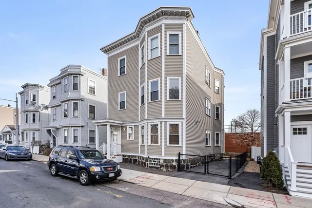 a car parked in front of a building
