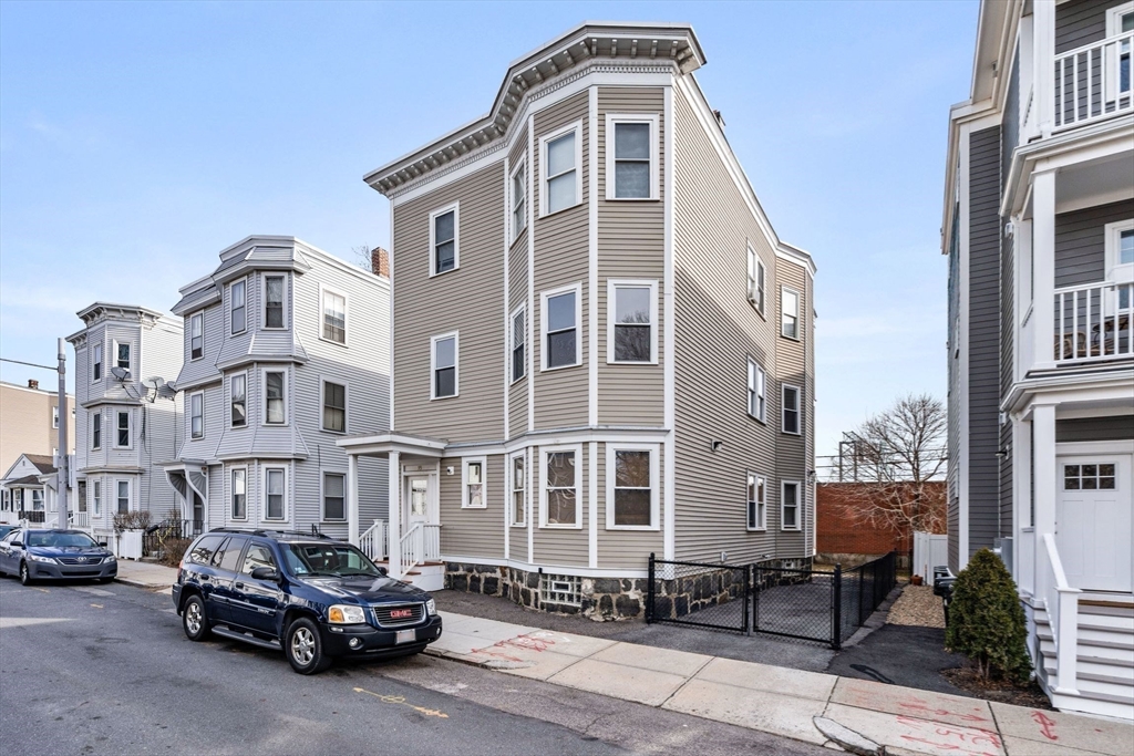 93 Sydney Street, Unit 3 Boston, MA 02125 - Photo 28 of 28 a car parked in front of a building