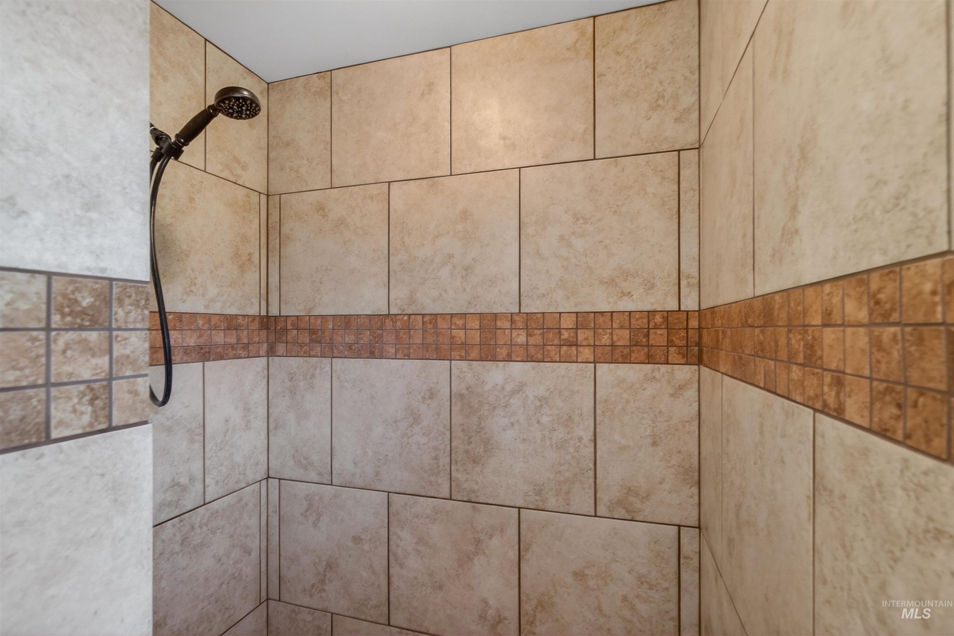 209 Walnut Drive Potlatch, ID 83855 - Photo 11 of 27 Bathroom view of a tile shower