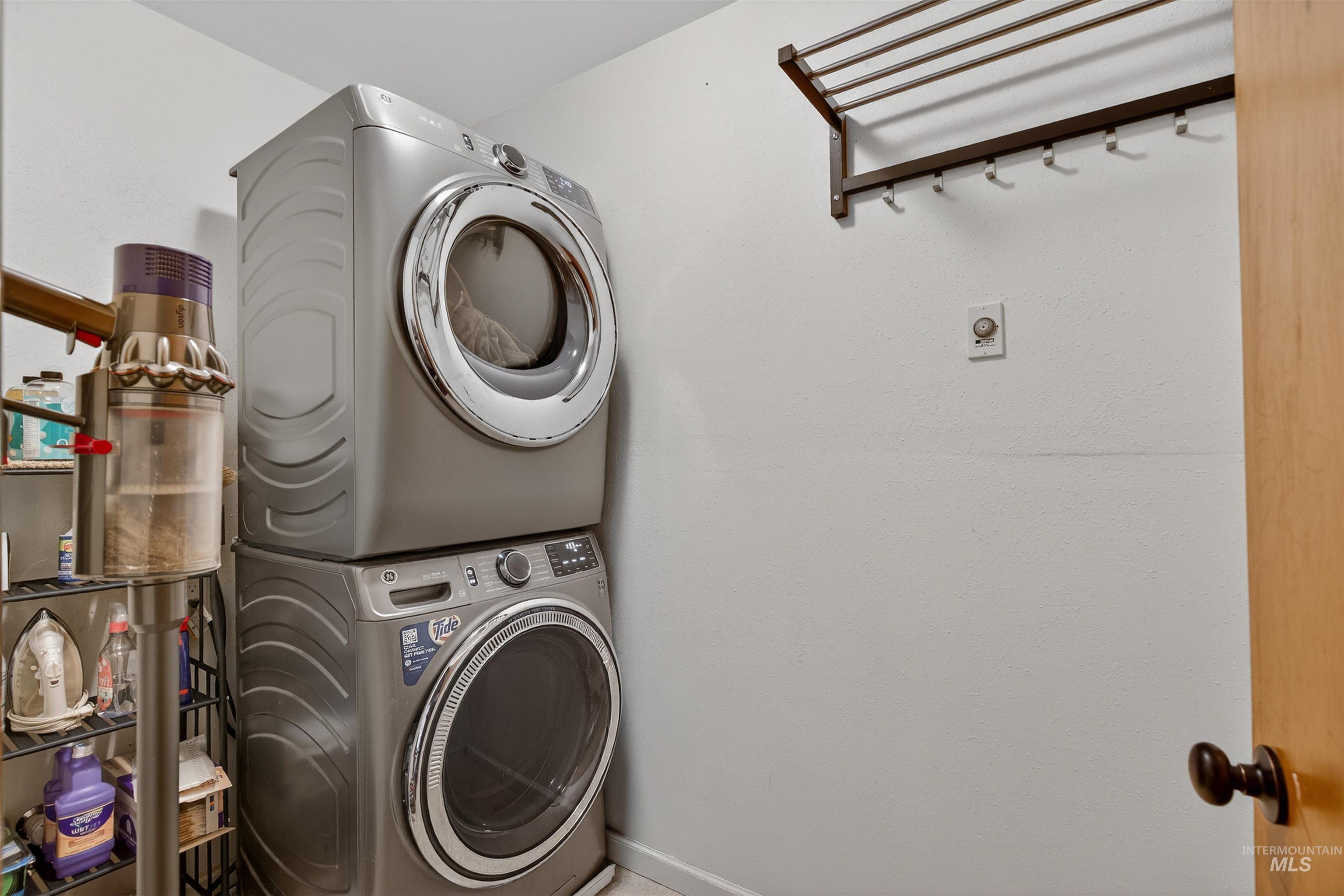 209 Walnut Drive Potlatch, ID 83855 - Photo 14 of 27 Laundry area featuring stacked washer and clothes dryer