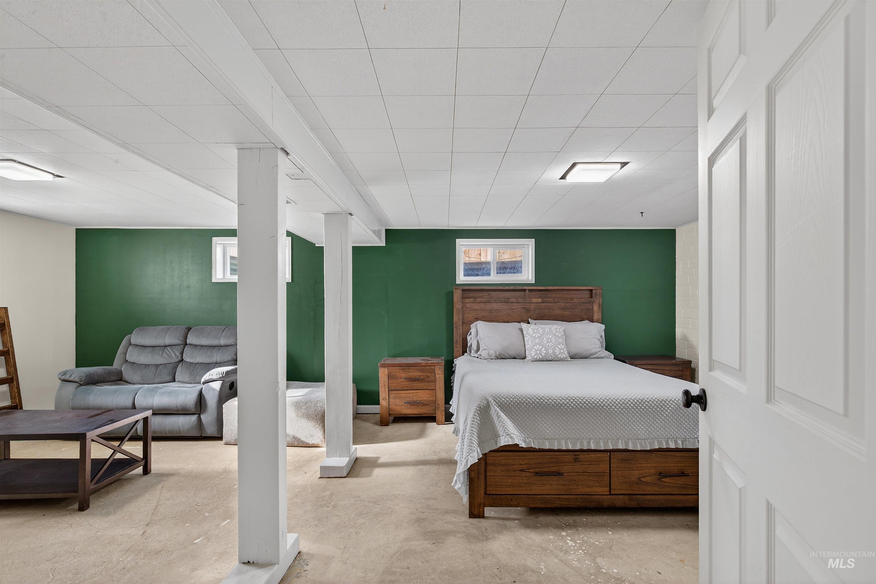 209 Walnut Drive Potlatch, ID 83855 - Photo 16 of 27 Bedroom featuring concrete floors