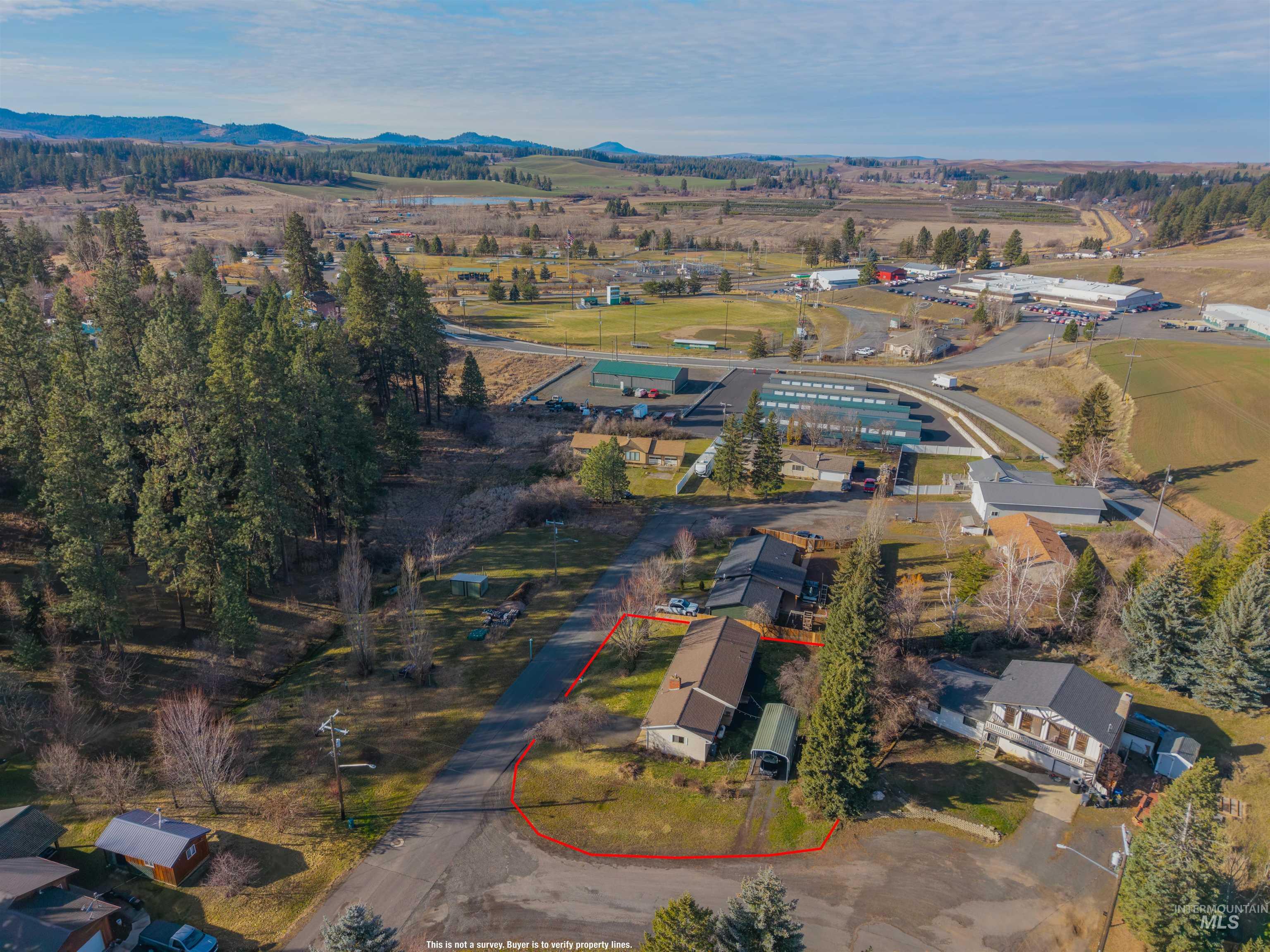 209 Walnut Drive Potlatch, ID 83855 - Photo 22 of 27 Aerial overview of property's location featuring property parcel outlined and a mountain backdrop