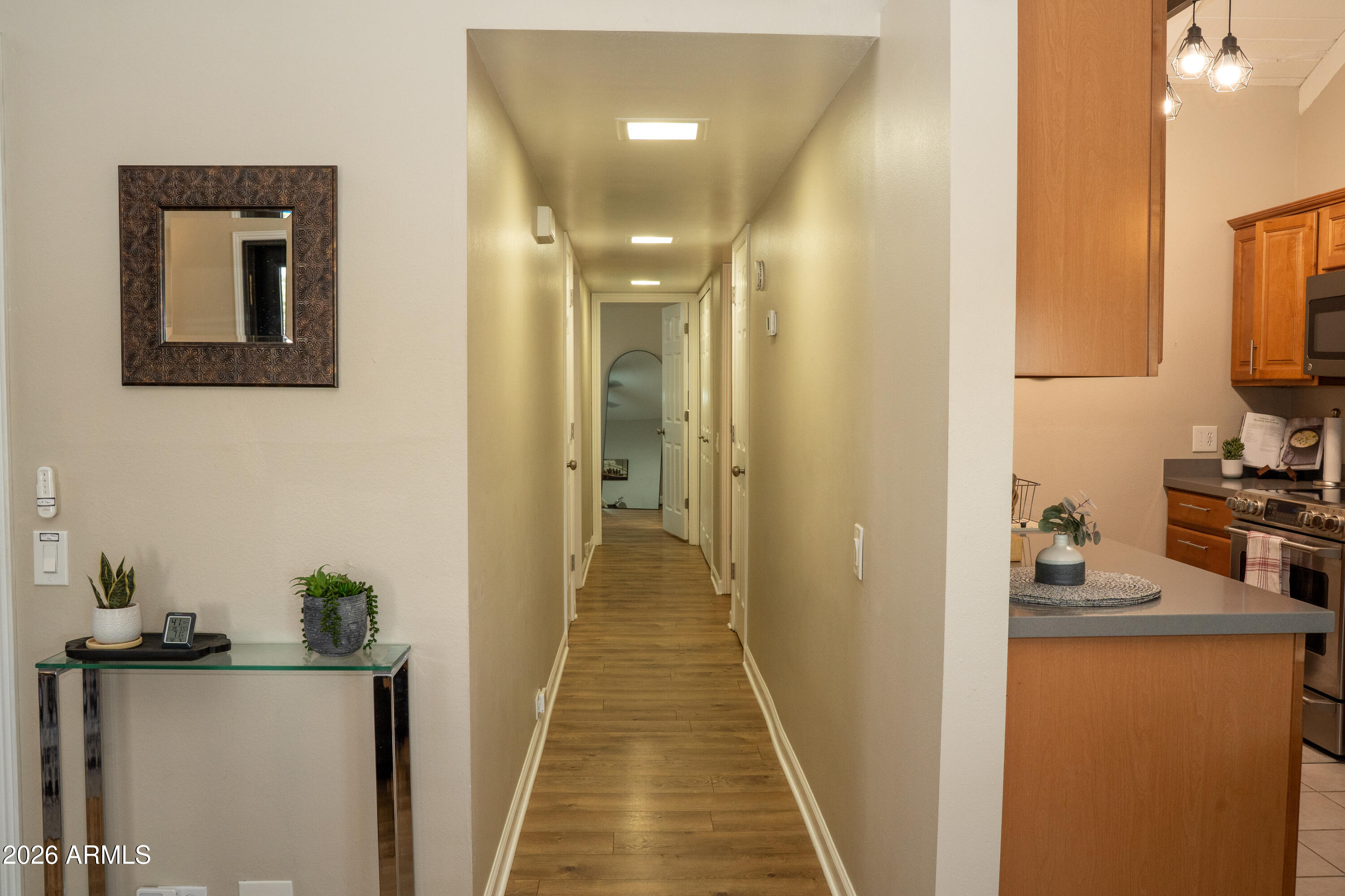 4313 North 28th Street Phoenix, AZ 85016 - Photo 11 of 26 a view of a hallway with workspace and living room