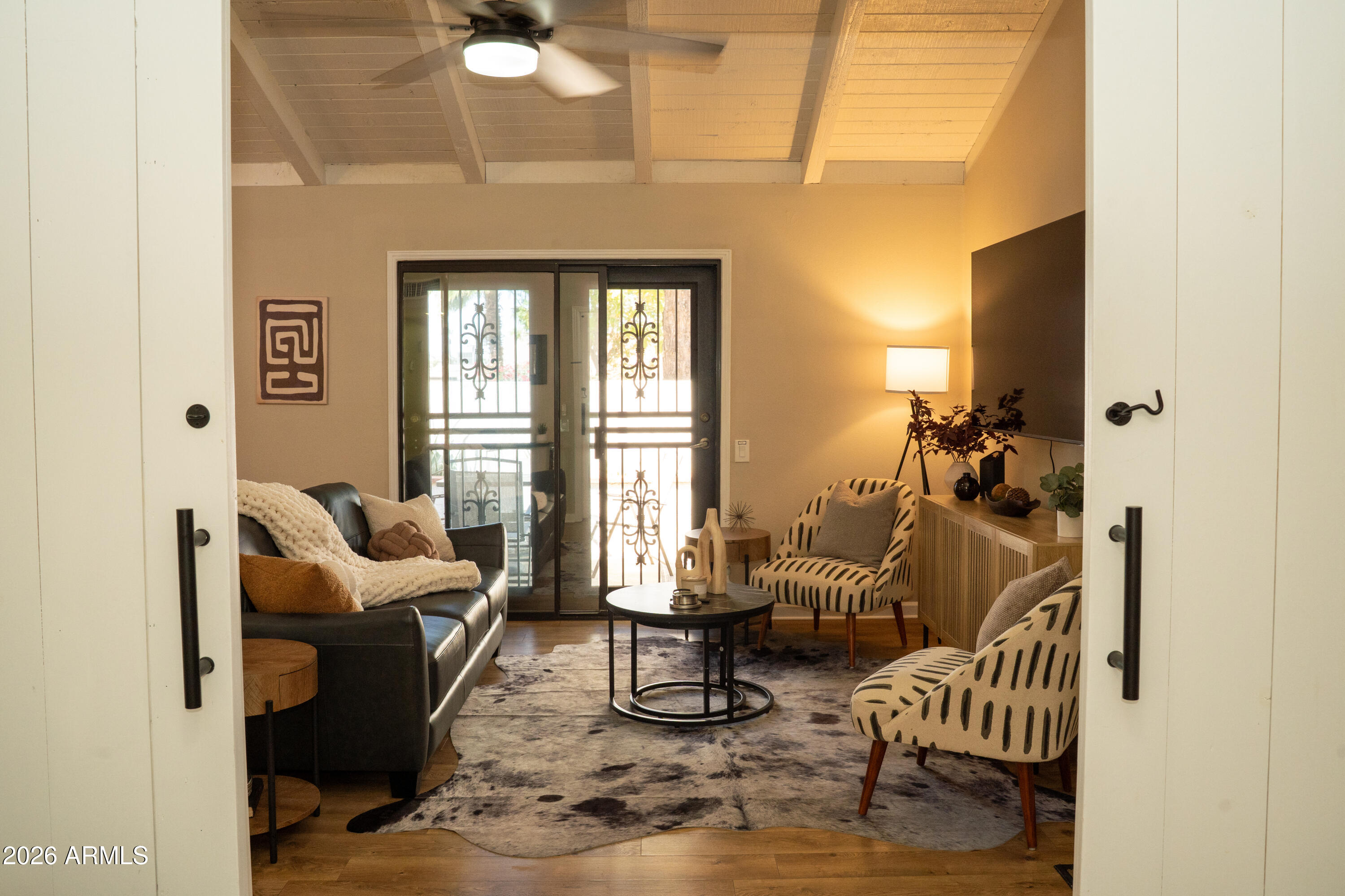 4313 North 28th Street Phoenix, AZ 85016 - Photo 5 of 26 a living room with furniture and wooden floor
