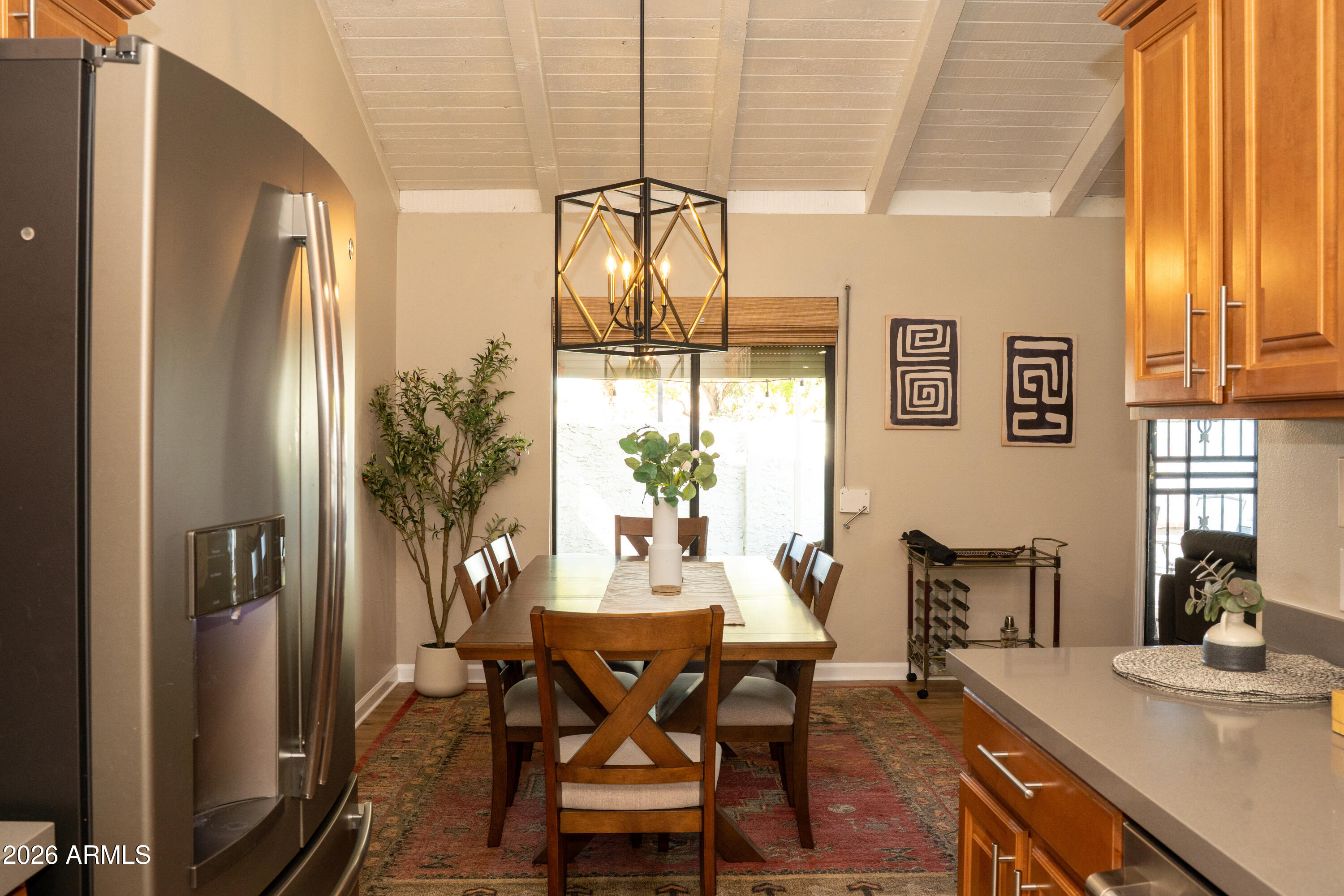 4313 North 28th Street Phoenix, AZ 85016 - Photo 8 of 26 a view of a dining room with furniture and window
