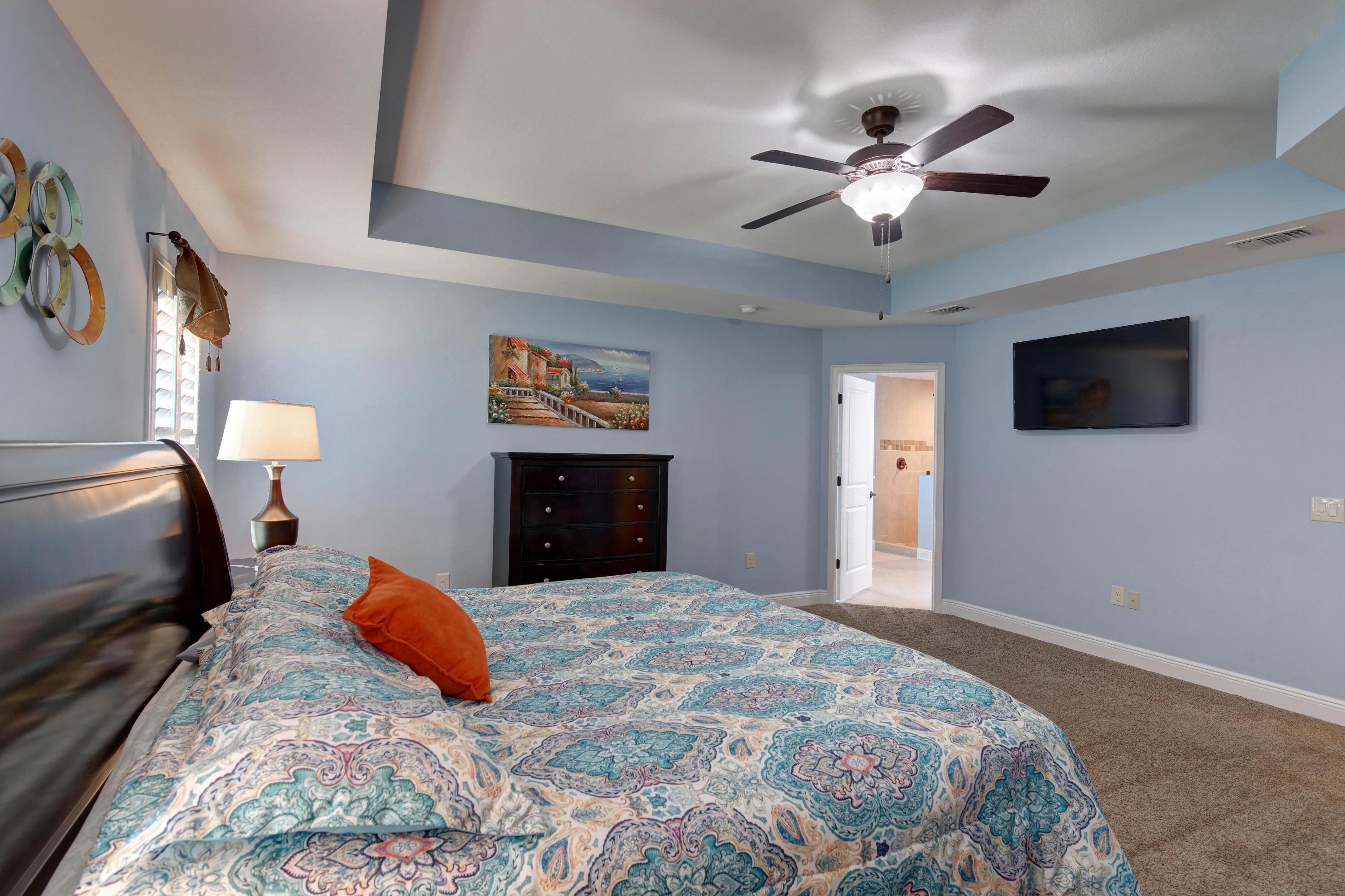 2592 Crescent Road Navarre, FL 32566 - Photo 26 of 67 a bed room with a bed and a flat screen tv