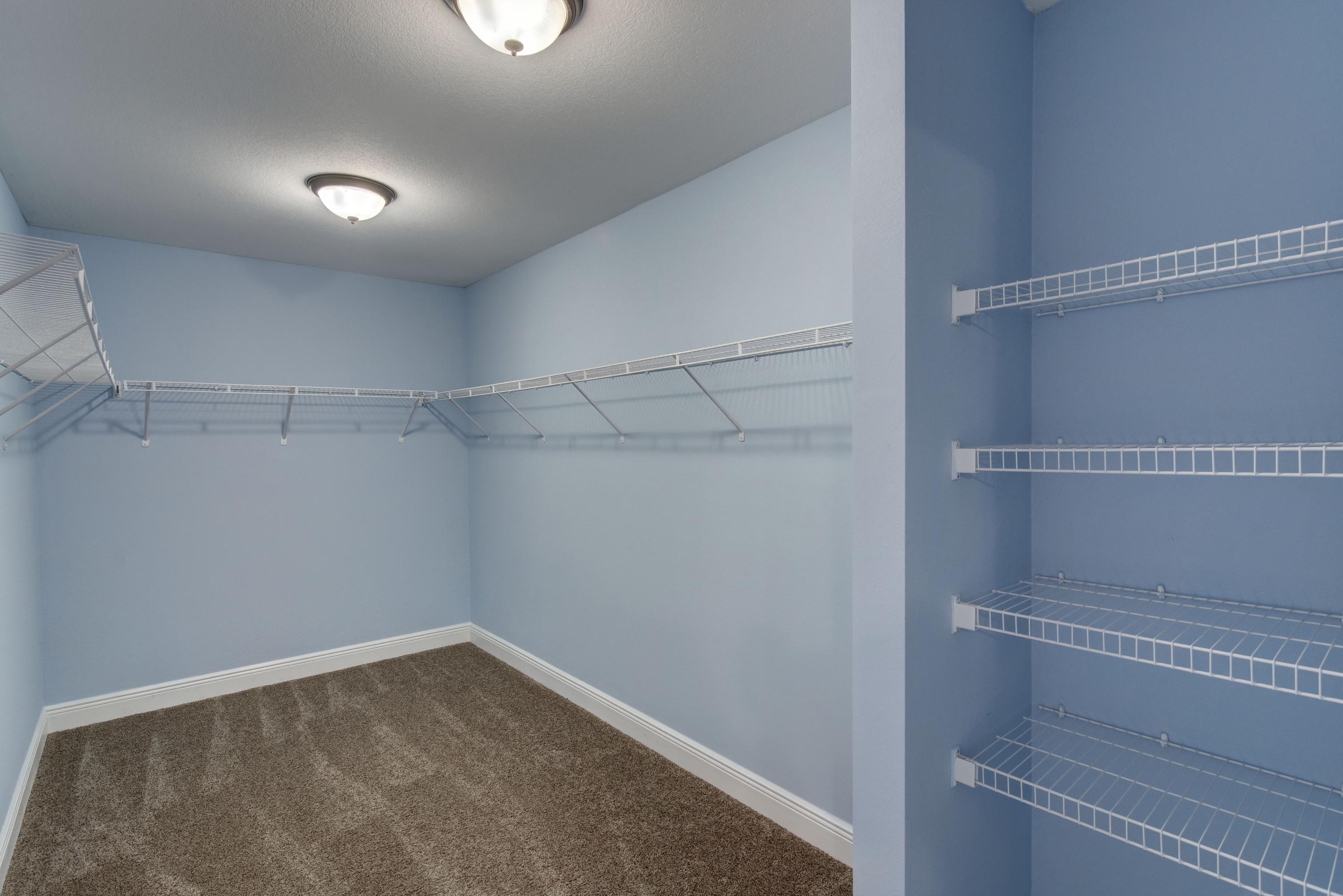 2592 Crescent Road Navarre, FL 32566 - Photo 29 of 67 a view of a room with racks on the wall