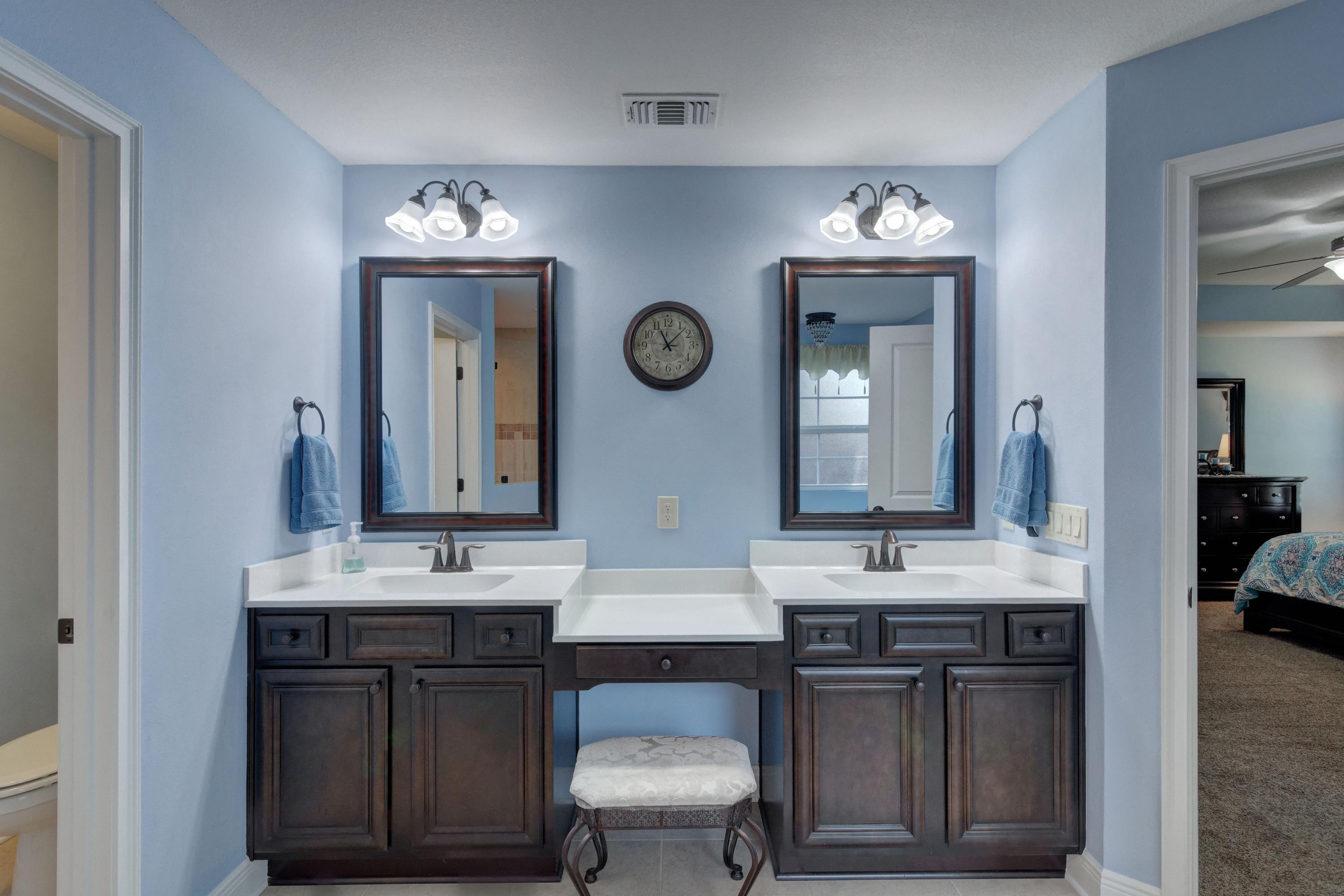 2592 Crescent Road Navarre, FL 32566 - Photo 31 of 67 a bathroom with a sink and a mirror