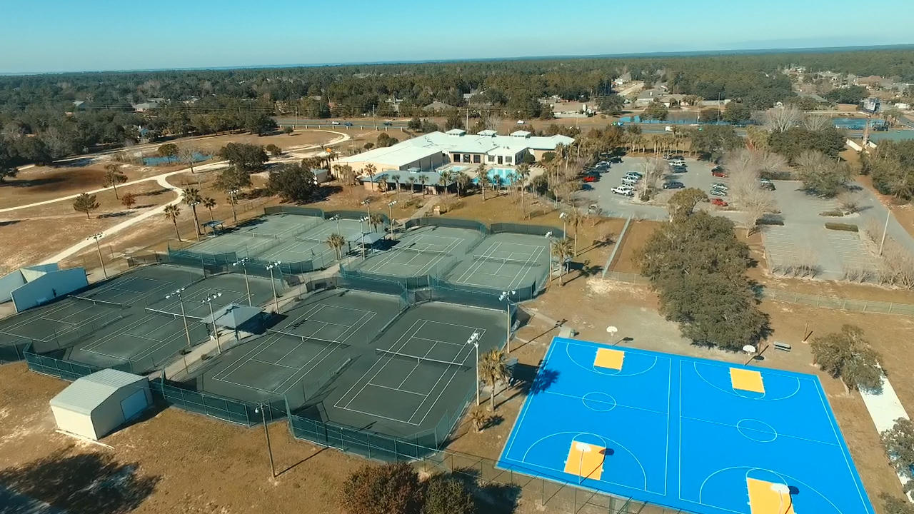 2592 Crescent Road Navarre, FL 32566 - Photo 66 of 67 an aerial view of a house with a yard