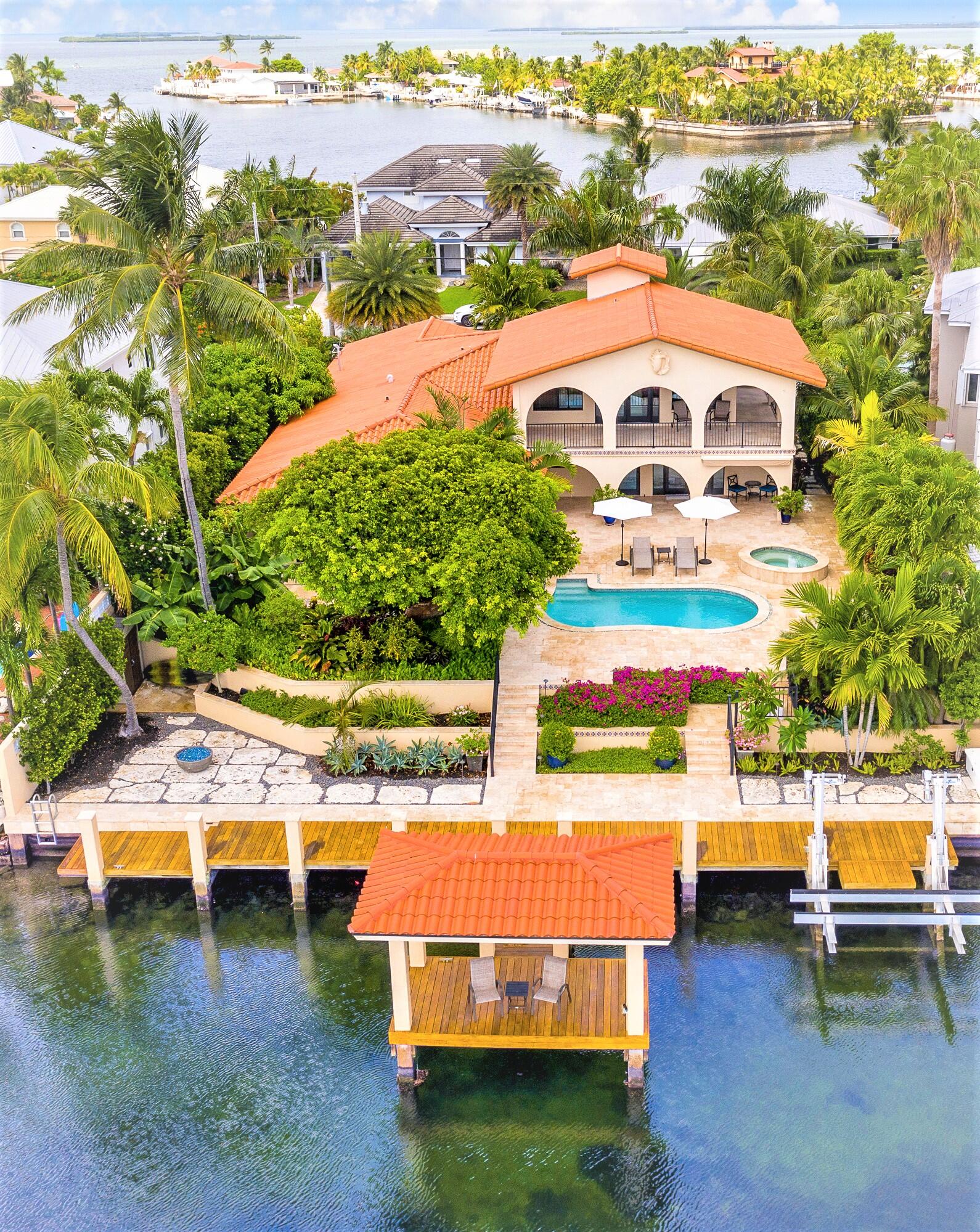 a view of swimming pool with outdoor seating and yard