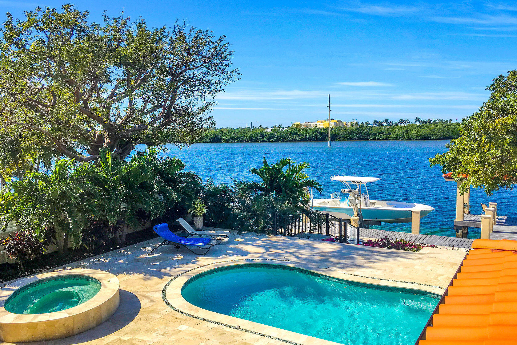 153 Key Haven Road Key West, FL 33040 - Photo 13 of 28 a view of a swimming pool with a patio
