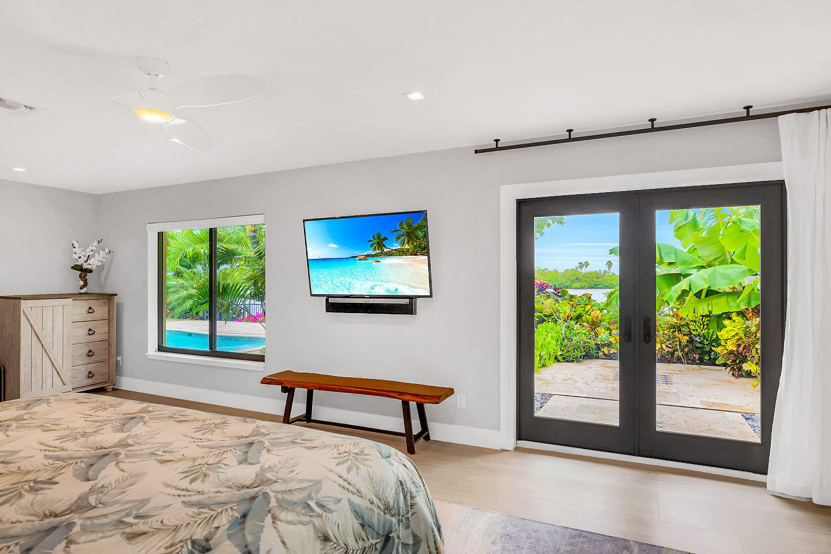 153 Key Haven Road Key West, FL 33040 - Photo 21 of 28 a bedroom with furniture and a window