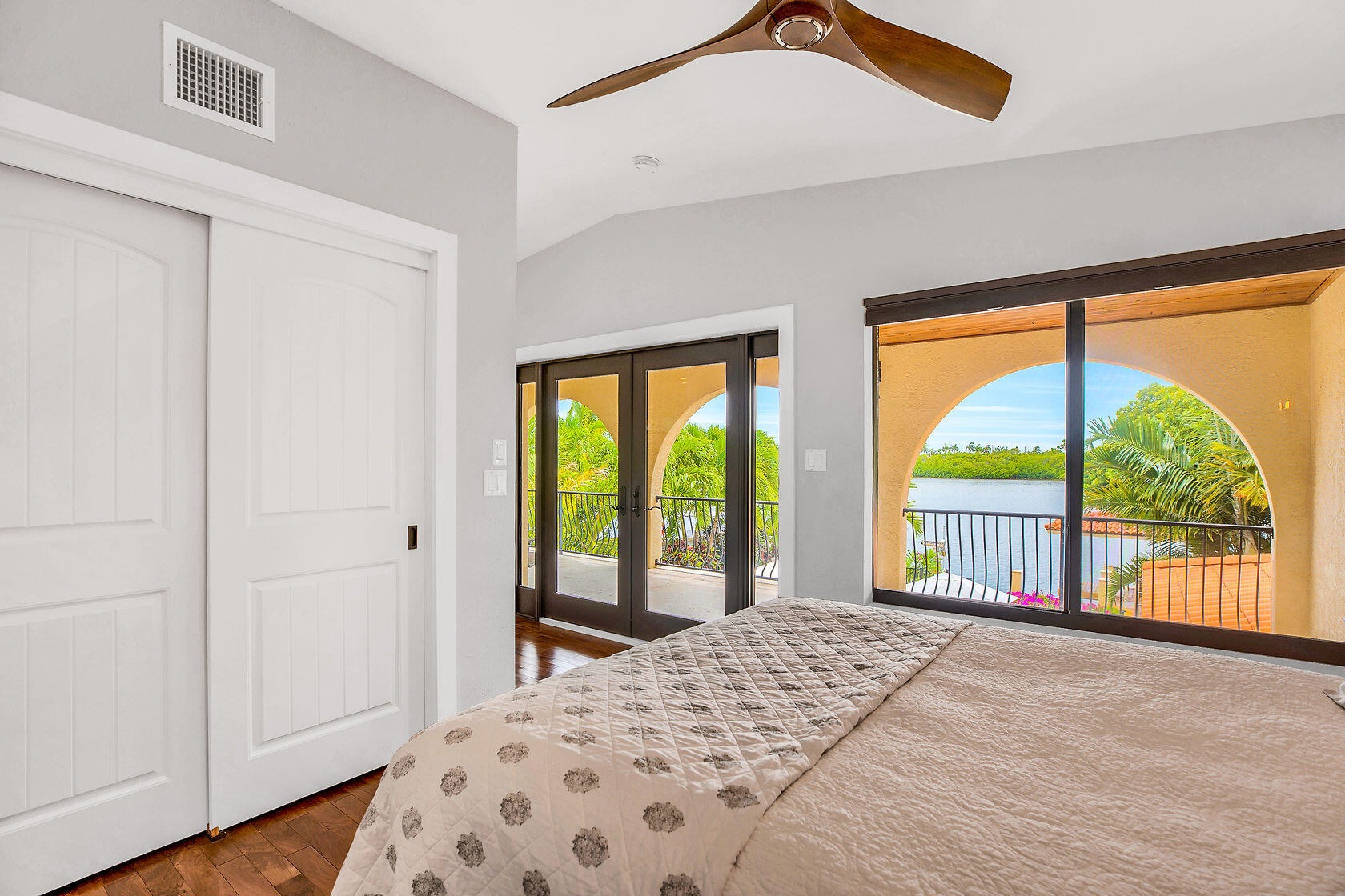 153 Key Haven Road Key West, FL 33040 - Photo 10 of 28 a bedroom with a bed and a large window