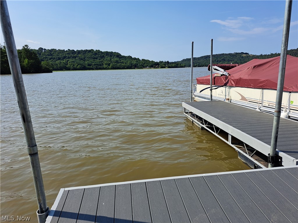 25910 Lashley Road Quaker City, OH 43773 - Photo 36 of 37 View of dock with a water view