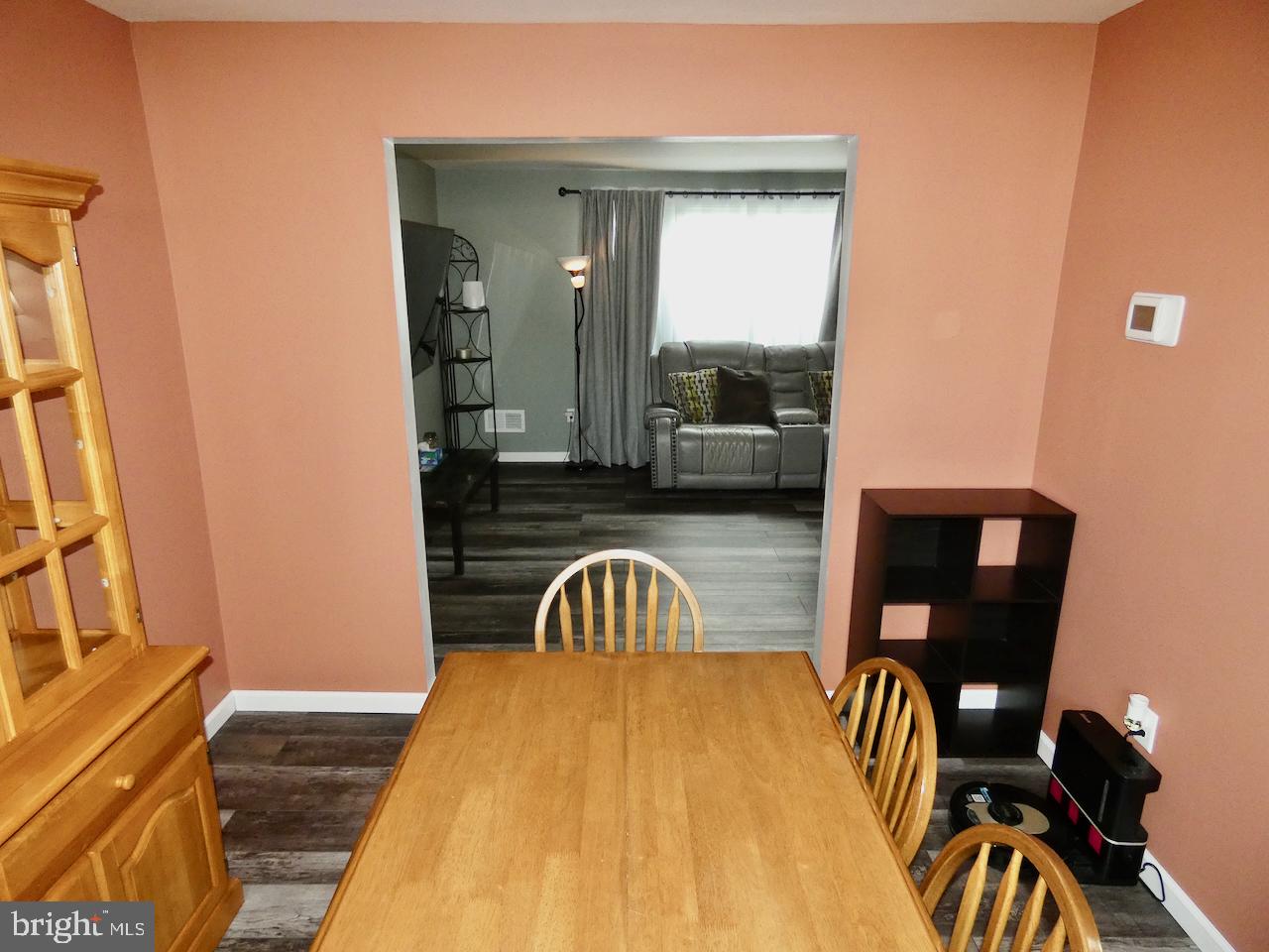 23 Upland Court Newark, DE 19713 - Photo 15 of 84 a bedroom with a bed and a mirror