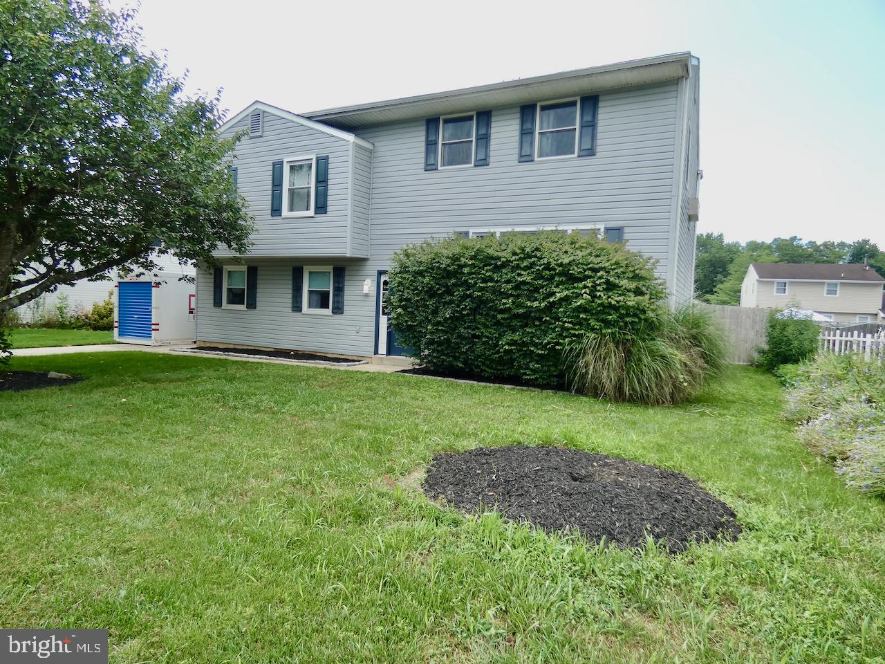 23 Upland Court Newark, DE 19713 - Photo 2 of 84 a house view with a garden space