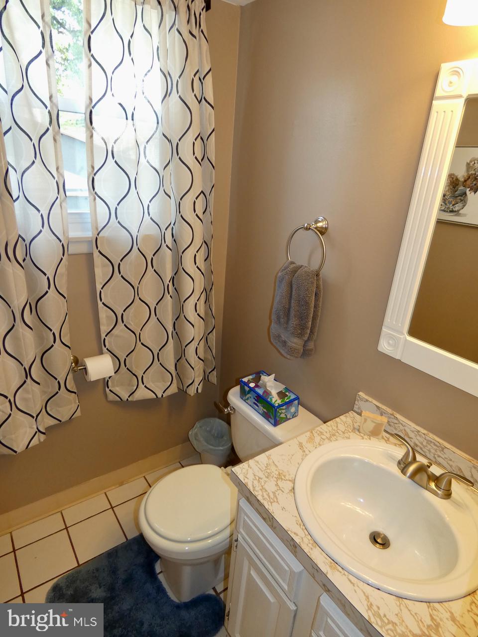 23 Upland Court Newark, DE 19713 - Photo 28 of 84 a bathroom with a sink and a toilet