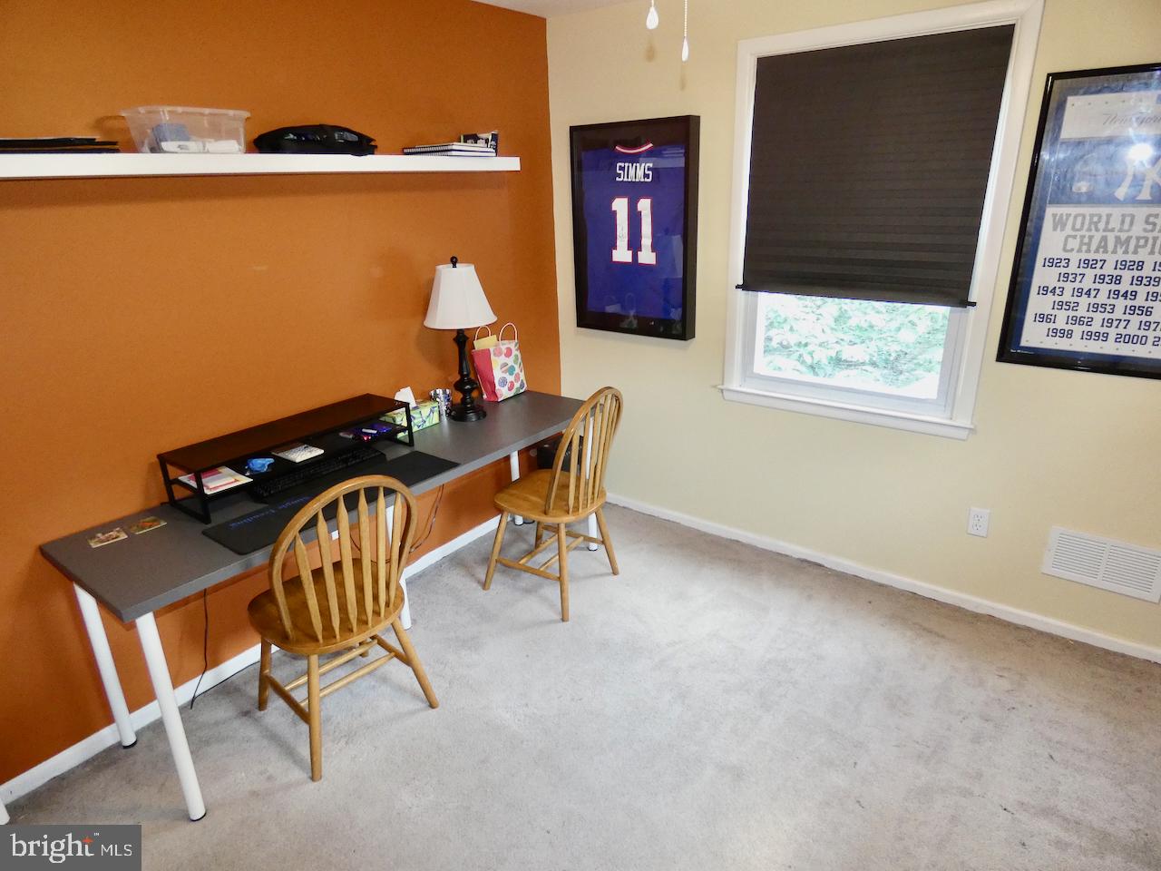 23 Upland Court Newark, DE 19713 - Photo 48 of 84 a living room with furniture and a window