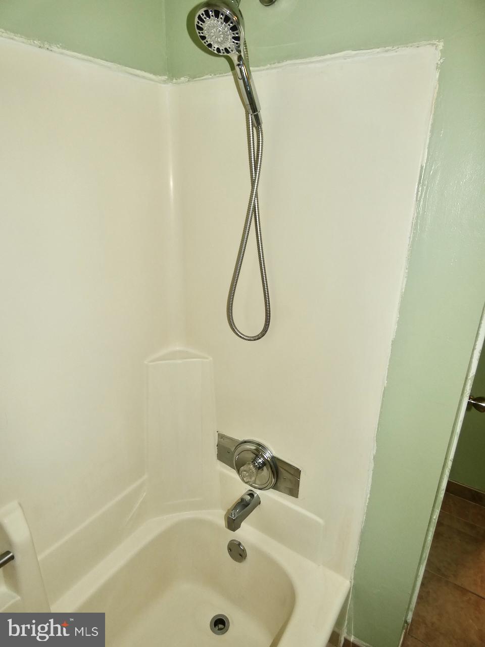 23 Upland Court Newark, DE 19713 - Photo 57 of 84 a bathroom with a bath tub and a shower