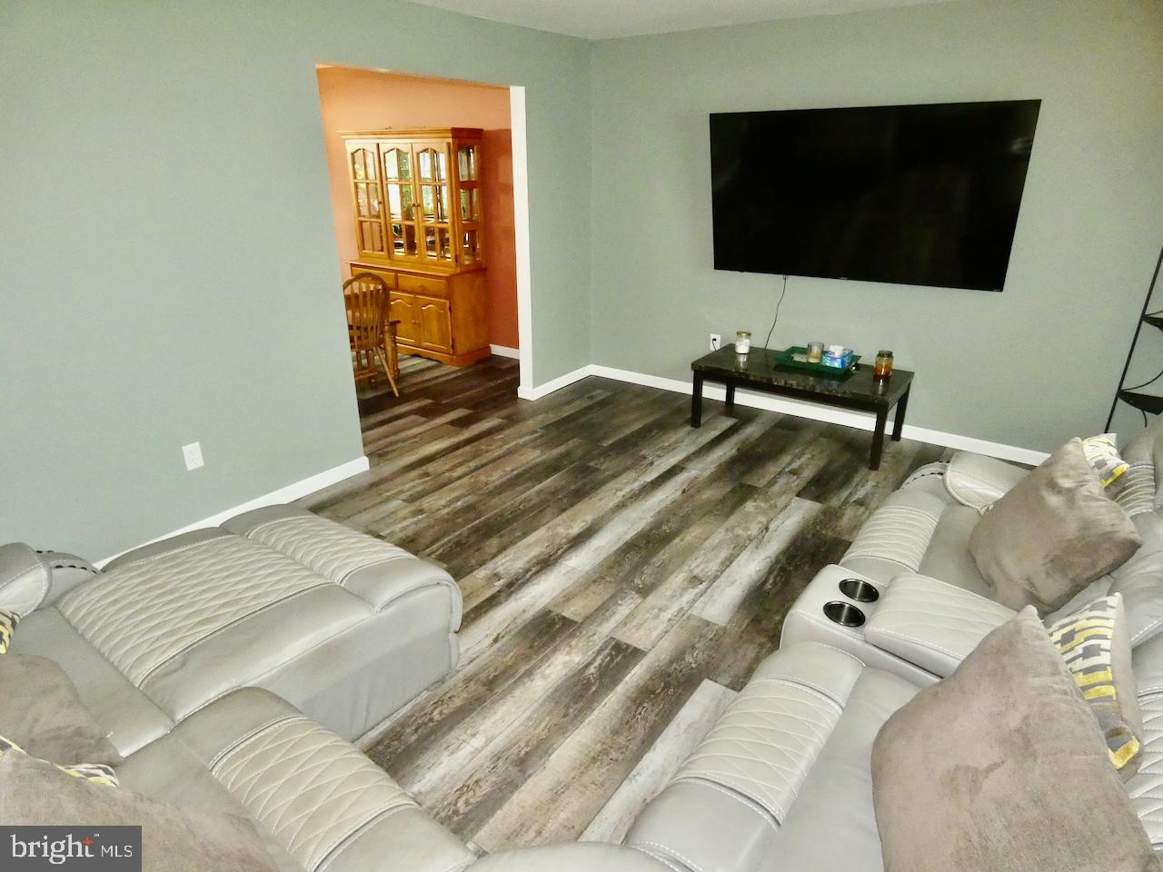 23 Upland Court Newark, DE 19713 - Photo 6 of 84 a bedroom with a bed and a flat screen tv