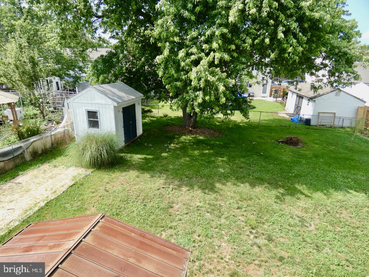 23 Upland Court Newark, DE 19713 - Photo 62 of 84 a view of backyard with a garden and plants