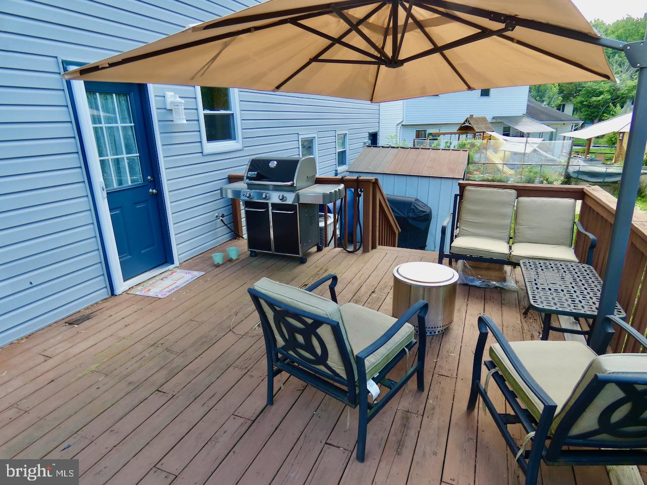 23 Upland Court Newark, DE 19713 - Photo 69 of 84 a table and chairs in patio of the house