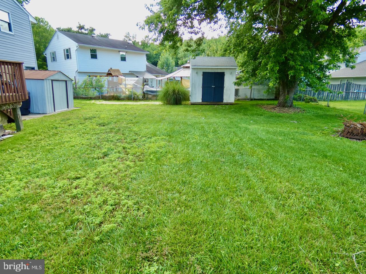23 Upland Court Newark, DE 19713 - Photo 73 of 84 a front view of house with yard and trees