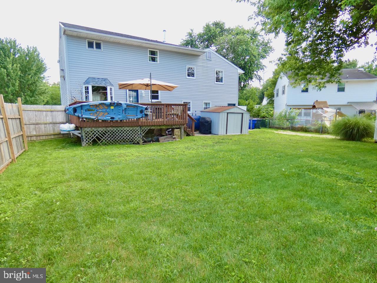 23 Upland Court Newark, DE 19713 - Photo 74 of 84 a backyard of a house with table and chairs