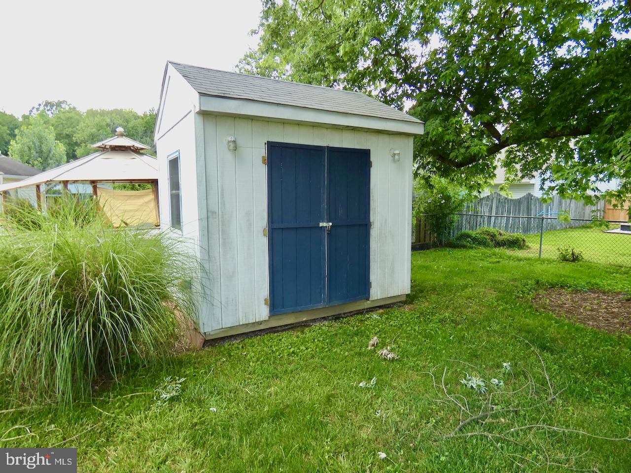 23 Upland Court Newark, DE 19713 - Photo 80 of 84 a view of backyard with potted plants and wooden fence