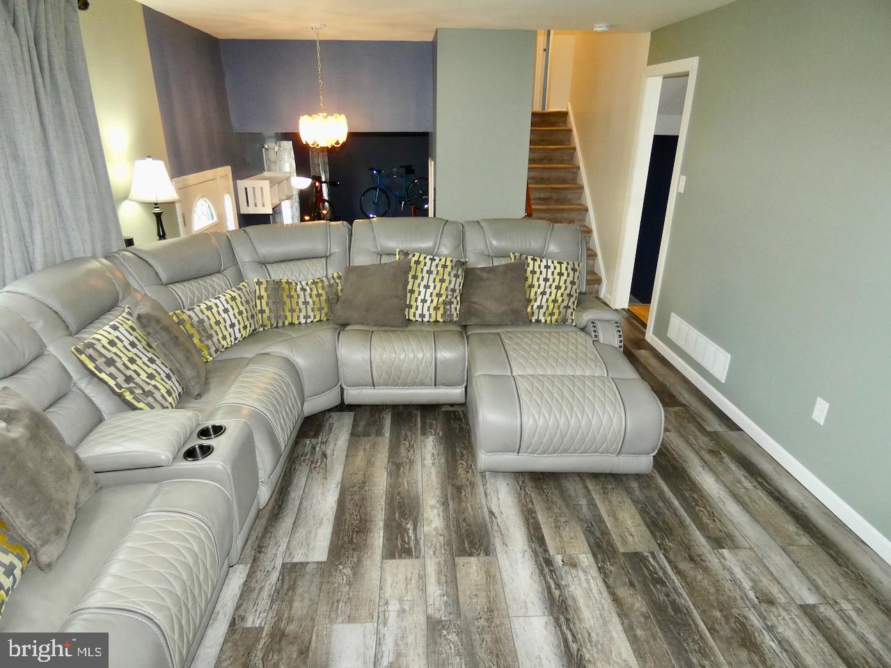 23 Upland Court Newark, DE 19713 - Photo 9 of 84 a living room with furniture and a fireplace