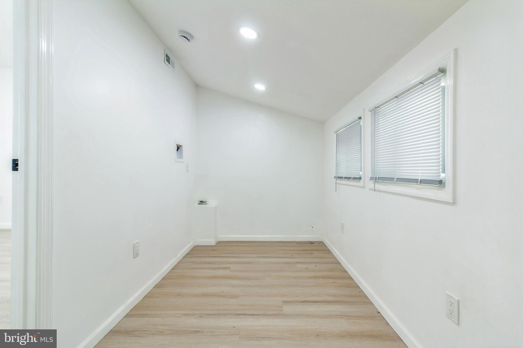 229 Shoemaker Road Bridgeton, NJ 08302 - Photo 8 of 29 a view of a hallway with wooden floor