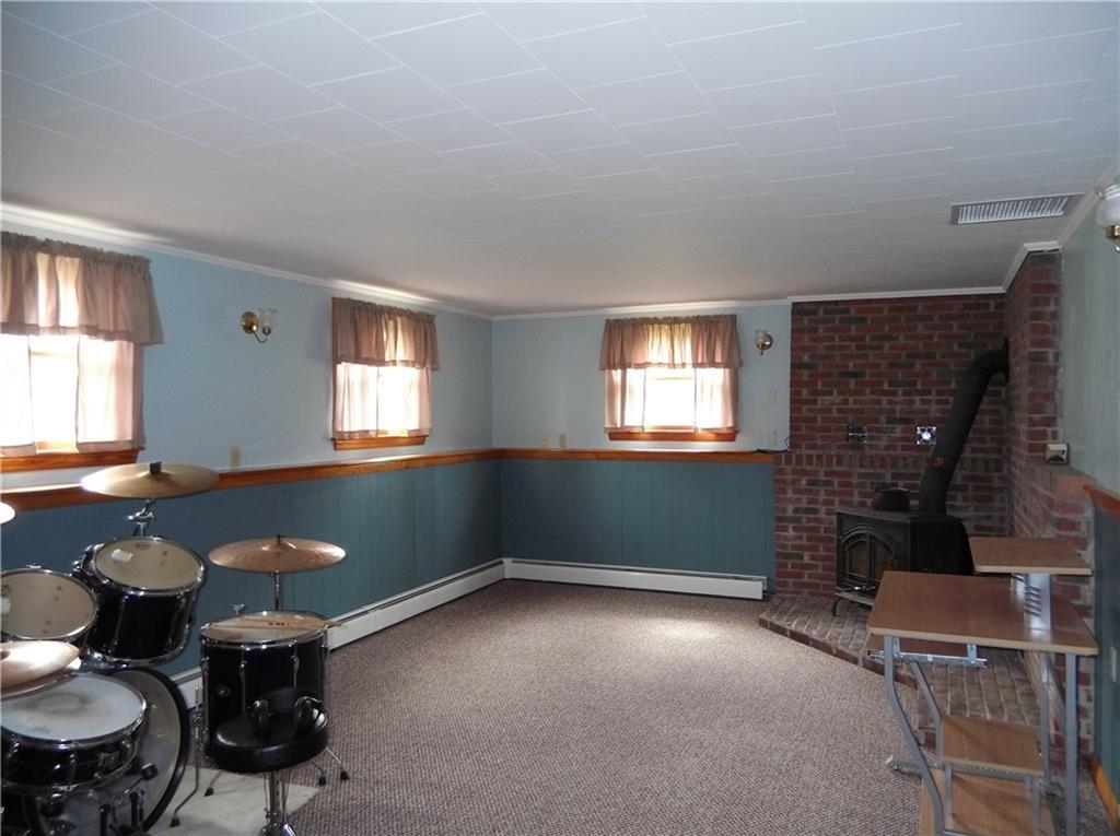29 Transalpine Road Lincoln, ME 04457 - Photo 28 of 32 Large Family Room with Wood Burning...