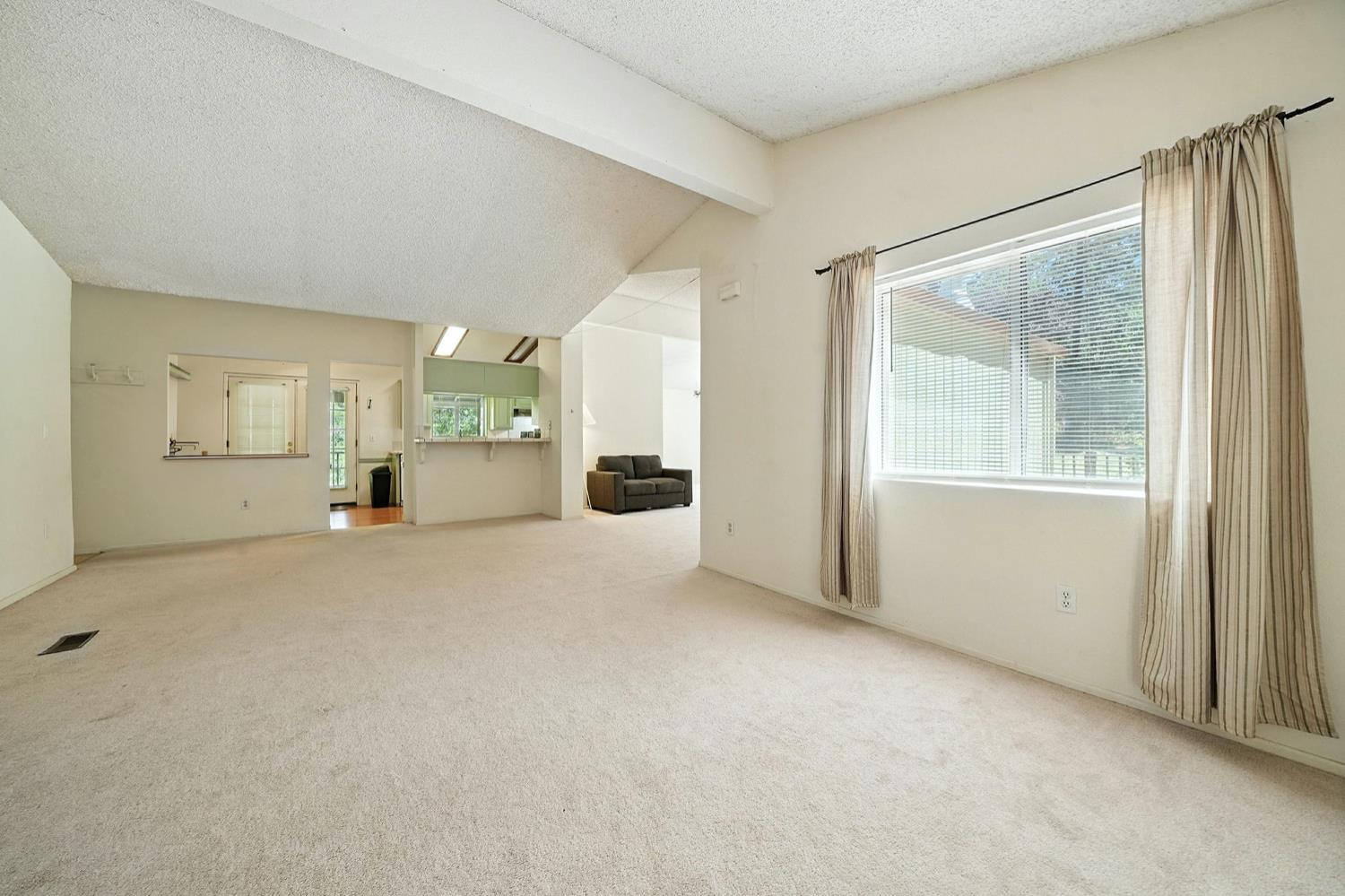 16000 Sutter Creek Road Sutter Creek, CA 95685 - Photo 12 of 80 an empty room with a cabinet and mirror