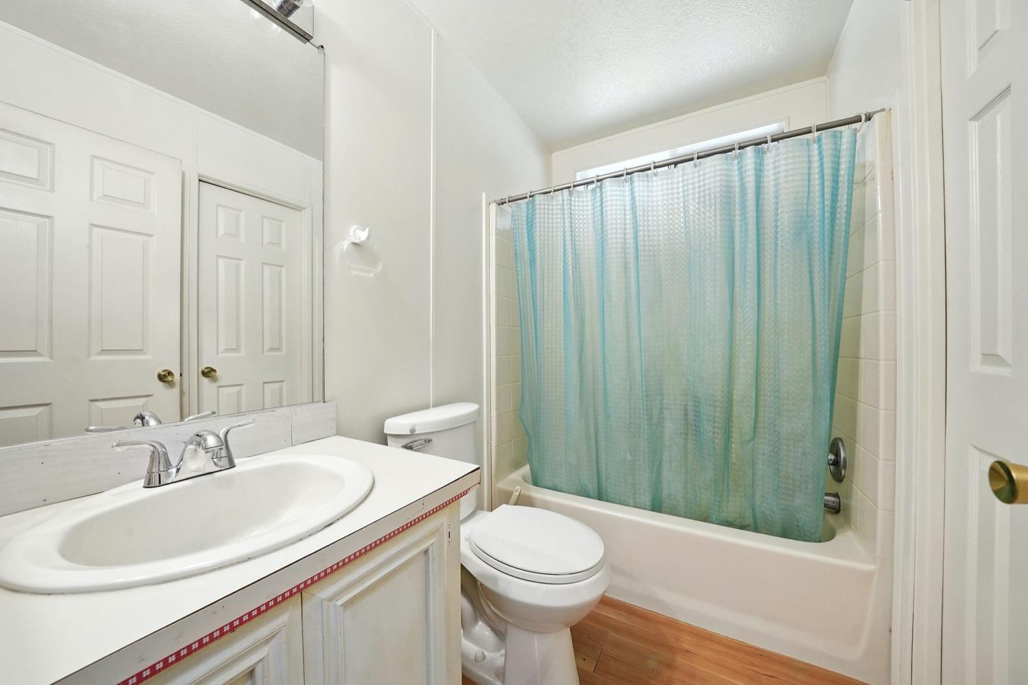 16000 Sutter Creek Road Sutter Creek, CA 95685 - Photo 20 of 80 a bathroom with a sink a toilet and shower