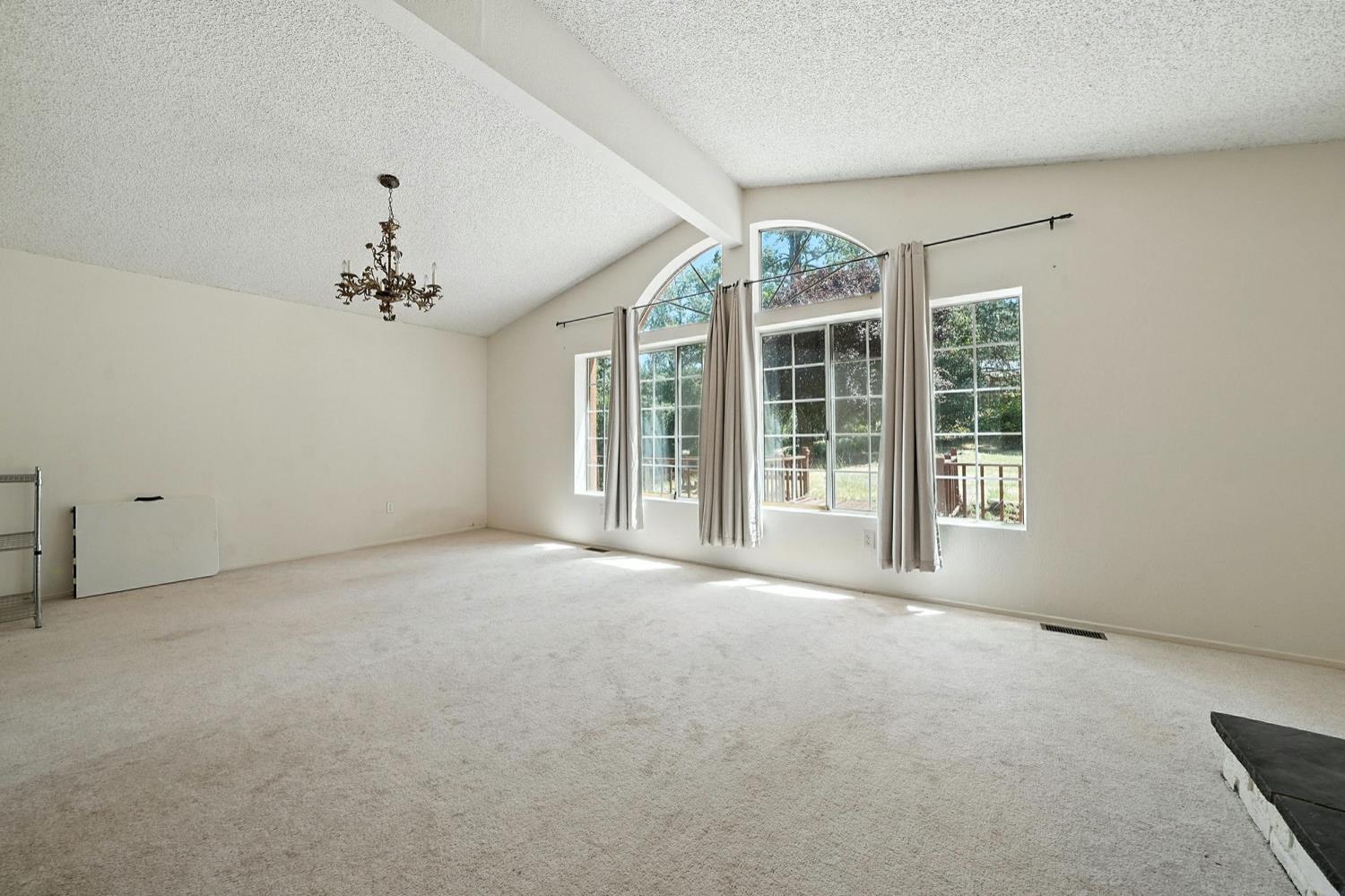 16000 Sutter Creek Road Sutter Creek, CA 95685 - Photo 3 of 80 a view of an empty room with a window