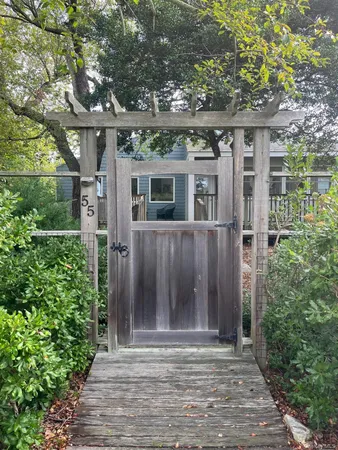 front view of a house with a small yard
