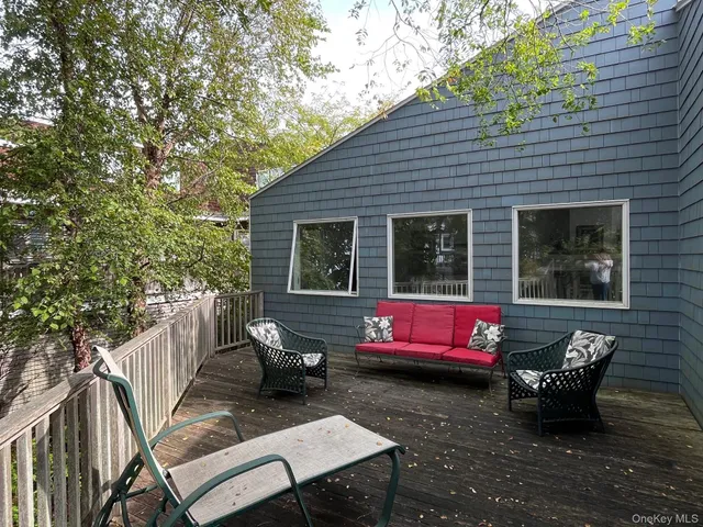 a backyard of a house with seating space