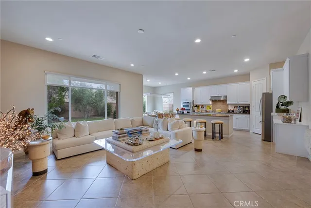 a bathroom with a granite countertop sink toilet a mirror and shower