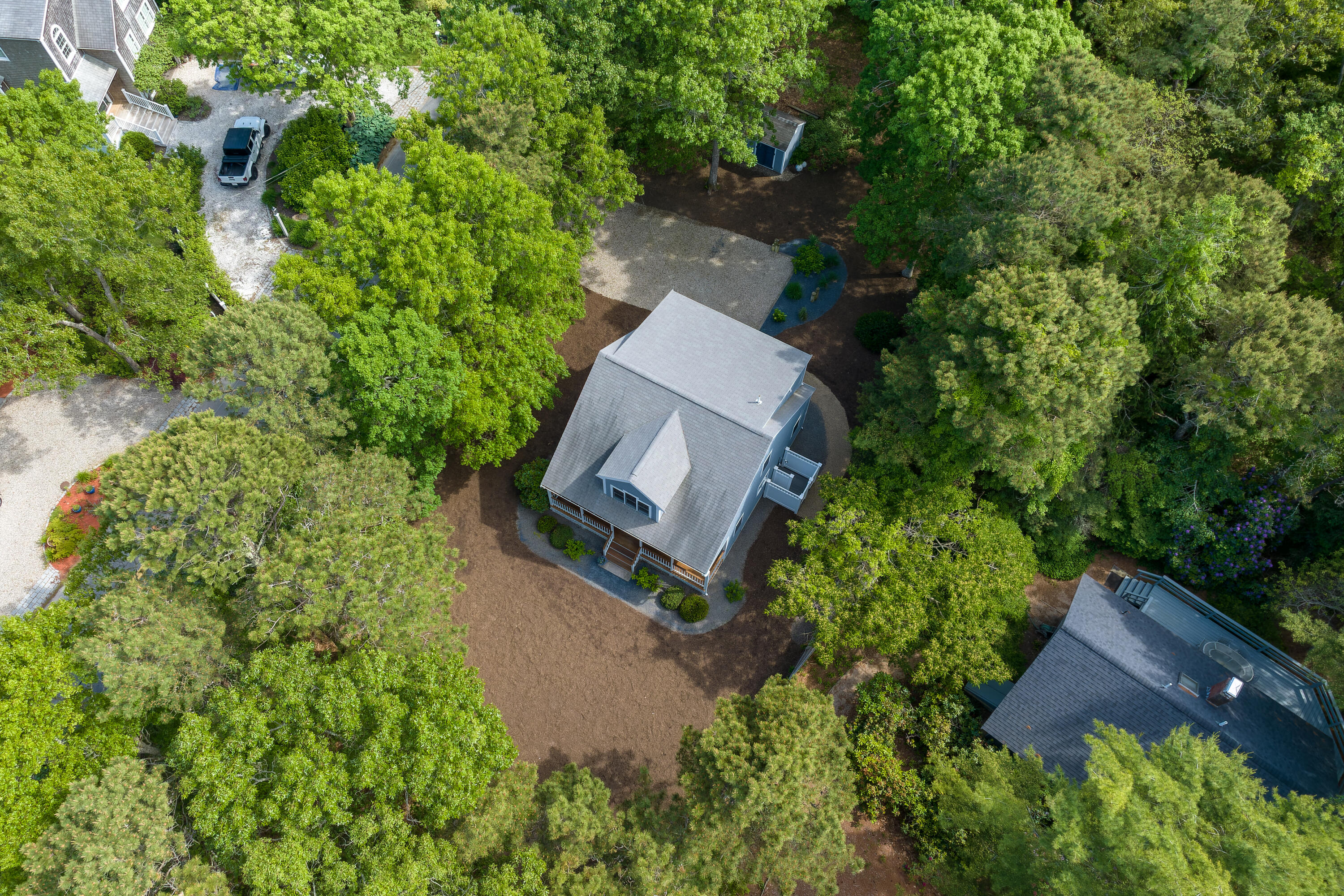 305 Monomoscoy Road Mashpee, MA 02649 - Photo 41 of 49 an aerial view of a house with a yard