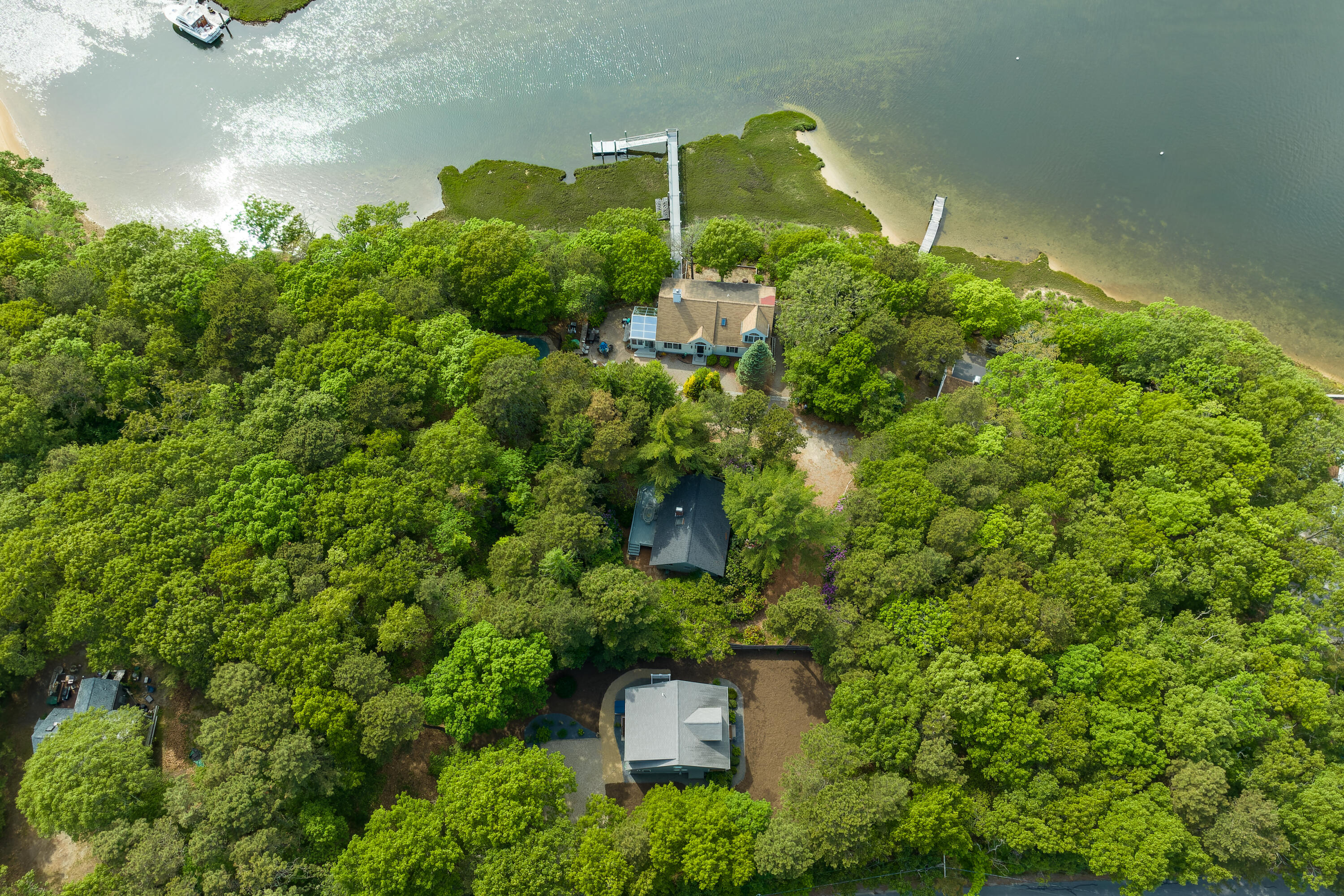 305 Monomoscoy Road Mashpee, MA 02649 - Photo 43 of 49 an aerial view of a house with a yard