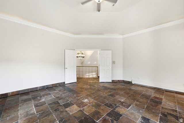 3535 Homestead Road Park City, UT 84098 - Photo 28 of 81 Spacious room featuring slate tile flooring, white walls, and elegant crown molding