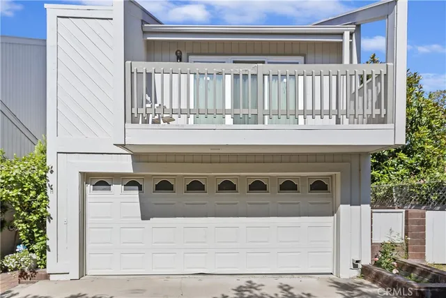 a view of a street with a building in the background