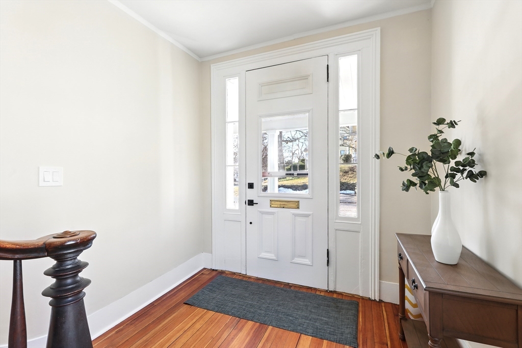 180 State Street, Unit A Northampton, MA 01060 - Photo 4 of 40 a view of a room with wooden floor and a potted plant