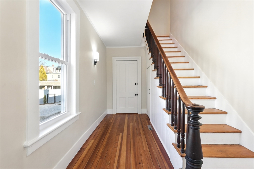 180 State Street, Unit A Northampton, MA 01060 - Photo 5 of 40 a view of wooden floor in a room