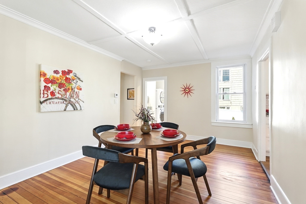 180 State Street, Unit A Northampton, MA 01060 - Photo 10 of 40 a view of a dining room with furniture and wooden floor