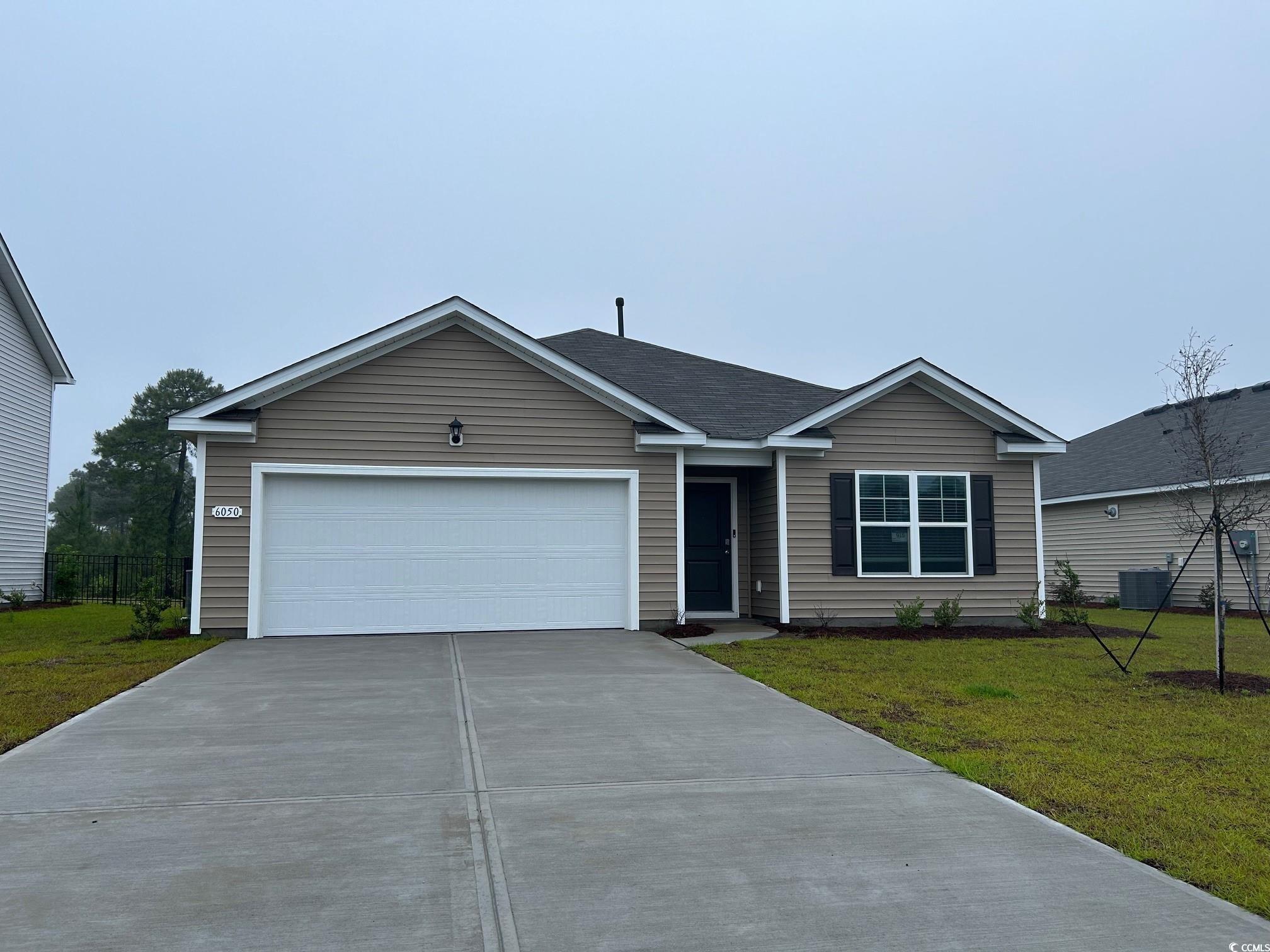 6050 Fuller Rdg Court Conway, SC 29526 - Photo 1 of 22 Ranch-style home with driveway, central air condit